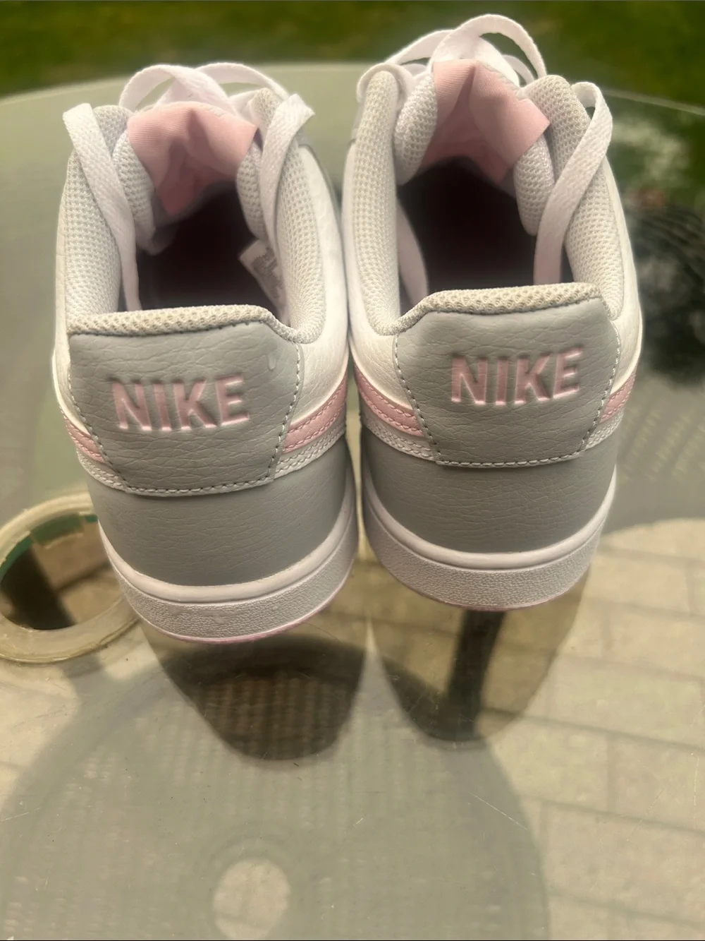 Nike Women's Low-Top Sneakers in White and Light Pink